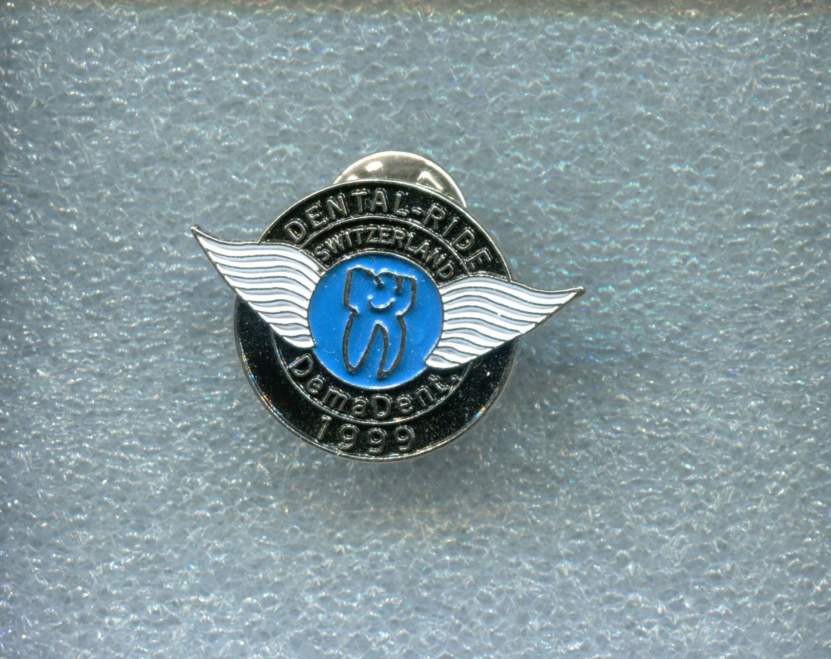 Placchette & Badge: DENTAL-RIDE  SWITZERLAND  1999 – Usato da Winterthur venduto da Sammleroase