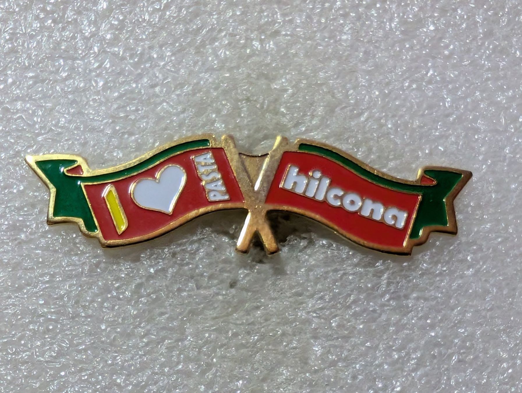 Placchette & Badge: Ansteckpin 107: hilcona – Usato da Oppligen venduto da Pin-Fall-Shop
