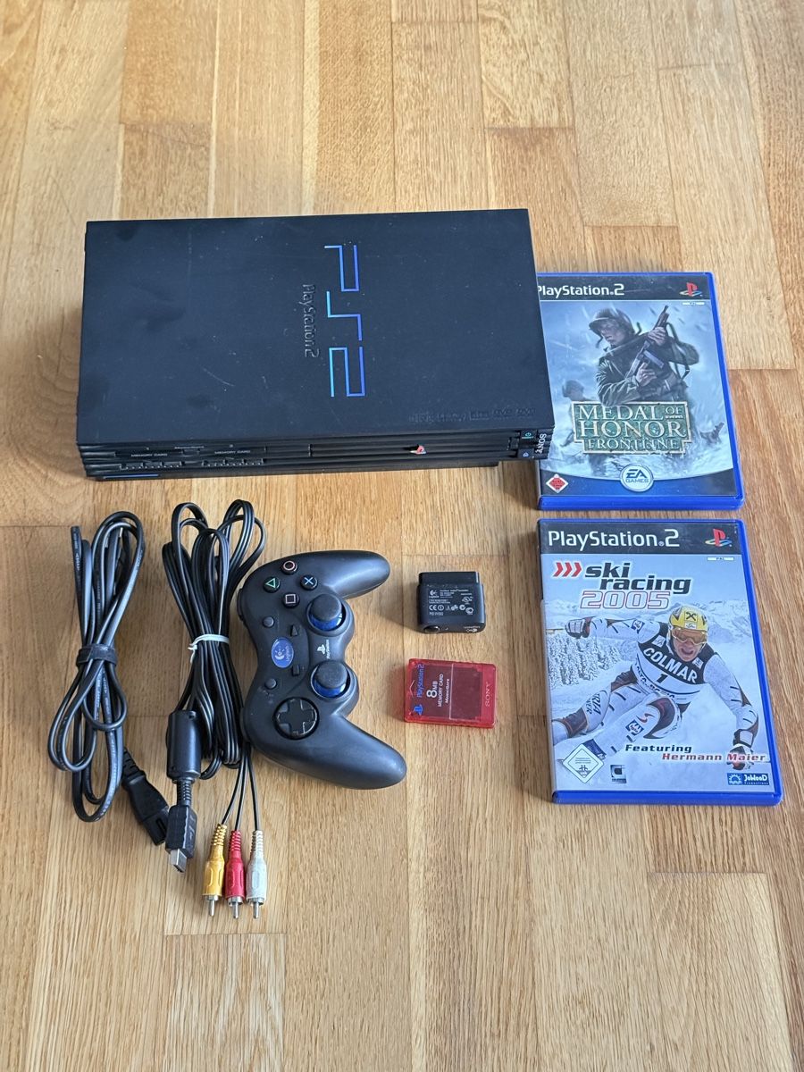 Sony Konsolen: Sony PS2 Fat SCPH-50004 + Logitech Wireless + 2 Spiele – Gebraucht aus Fehraltorf von Lenal01