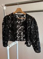 Bolero und Jacke