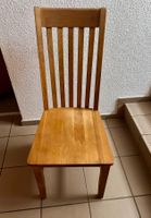 4 robuste Holzstühle