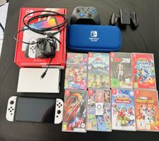 Nintendo Switch Oled inkl 8 Games + komplettem Zubehör