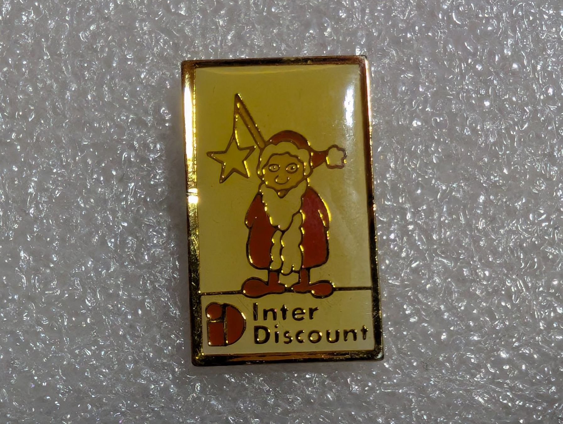 Plaketten & Abzeichen: Ansteckpin 265: Interdiscount – Gebraucht aus Oppligen von Pin-Fall-Shop