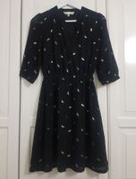 Kleid von YUMI schwarz mit Goldmuster / Grösse 36