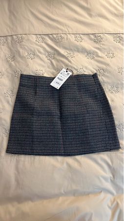 Mini-jupe Zara à carreaux, taille M en laine