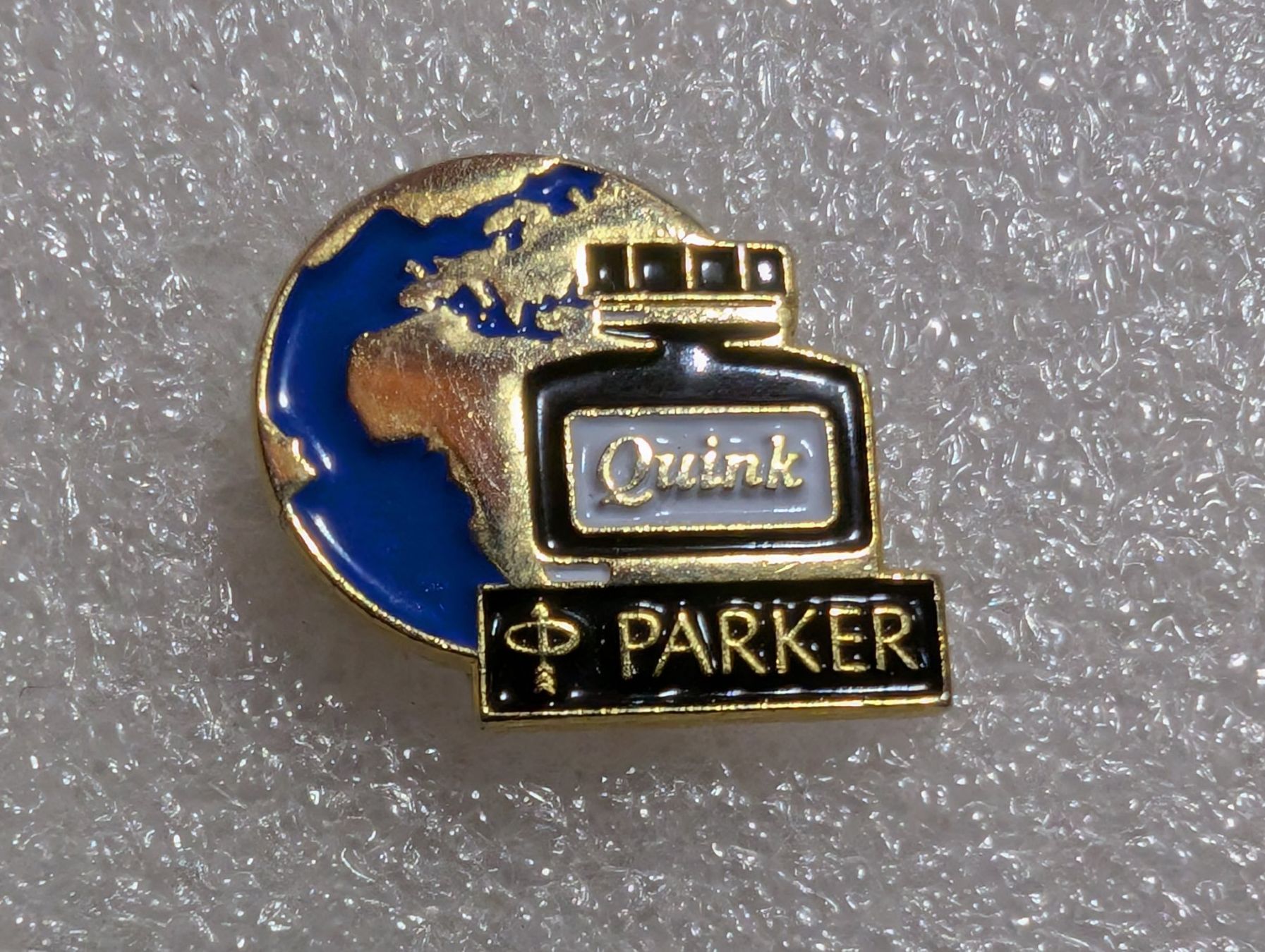 Placchette & Badge: Ansteckpin 153: Quink Parker – Usato da Oppligen venduto da Pin-Fall-Shop