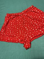 Shorts Tezenis rossi con stampa floreale,tgM,L-perfetti