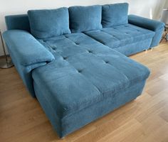 Gut erhaltenes türkisblaues Ecksofa aus Stoff