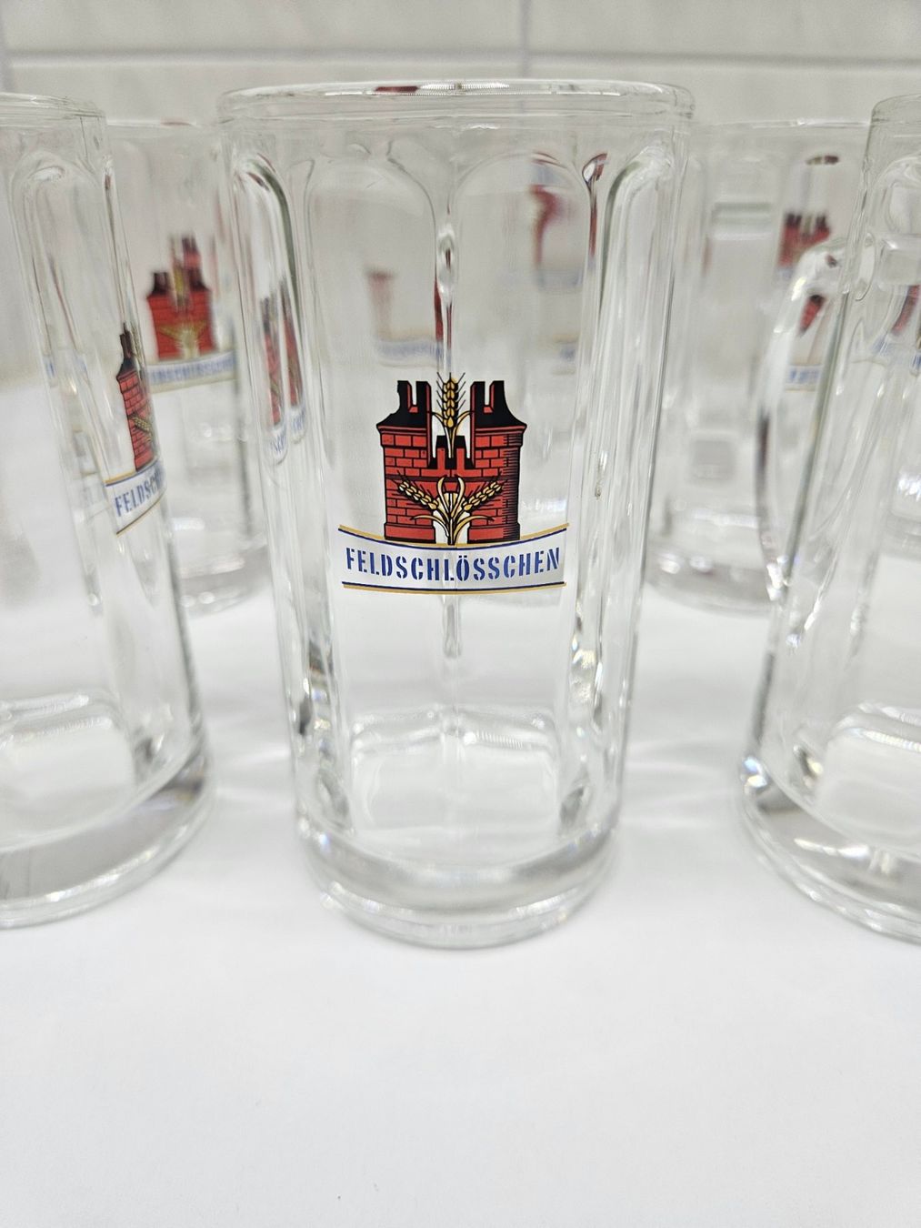 Feldschlösschen Bicchieri: 11x 0.25 Henkelglas Feldschlösschen. – Usato da Teufenthal AG venduto da boebe071 1