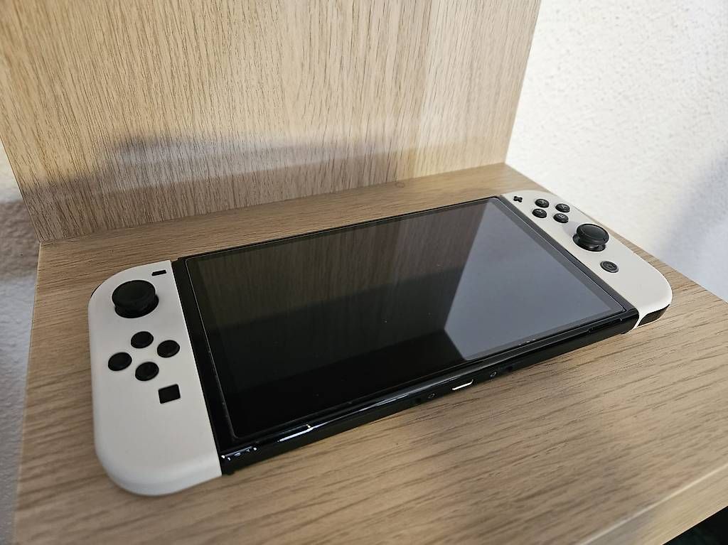 Konsolen: Nintendo Switch OLED – Gebraucht aus Steinen von Manjix 2
