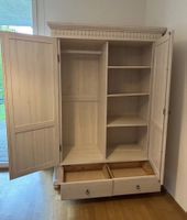 Wardrobe with broken backboards