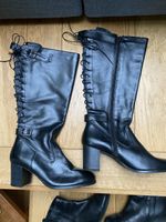 Longues bottes noires mollet XL laçage réglable p. 40