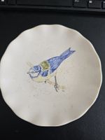Antiker Teller mit Blaumeise