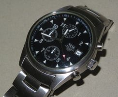 HERRENUHR TCM mit Datum, läuft  (CHRONOMETER defekt)