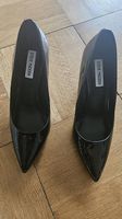 Steve Madden black patent pumps