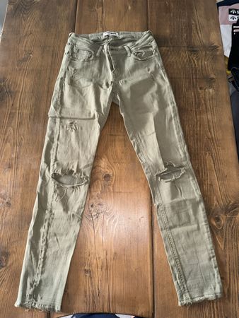 Pantalon slim à trous