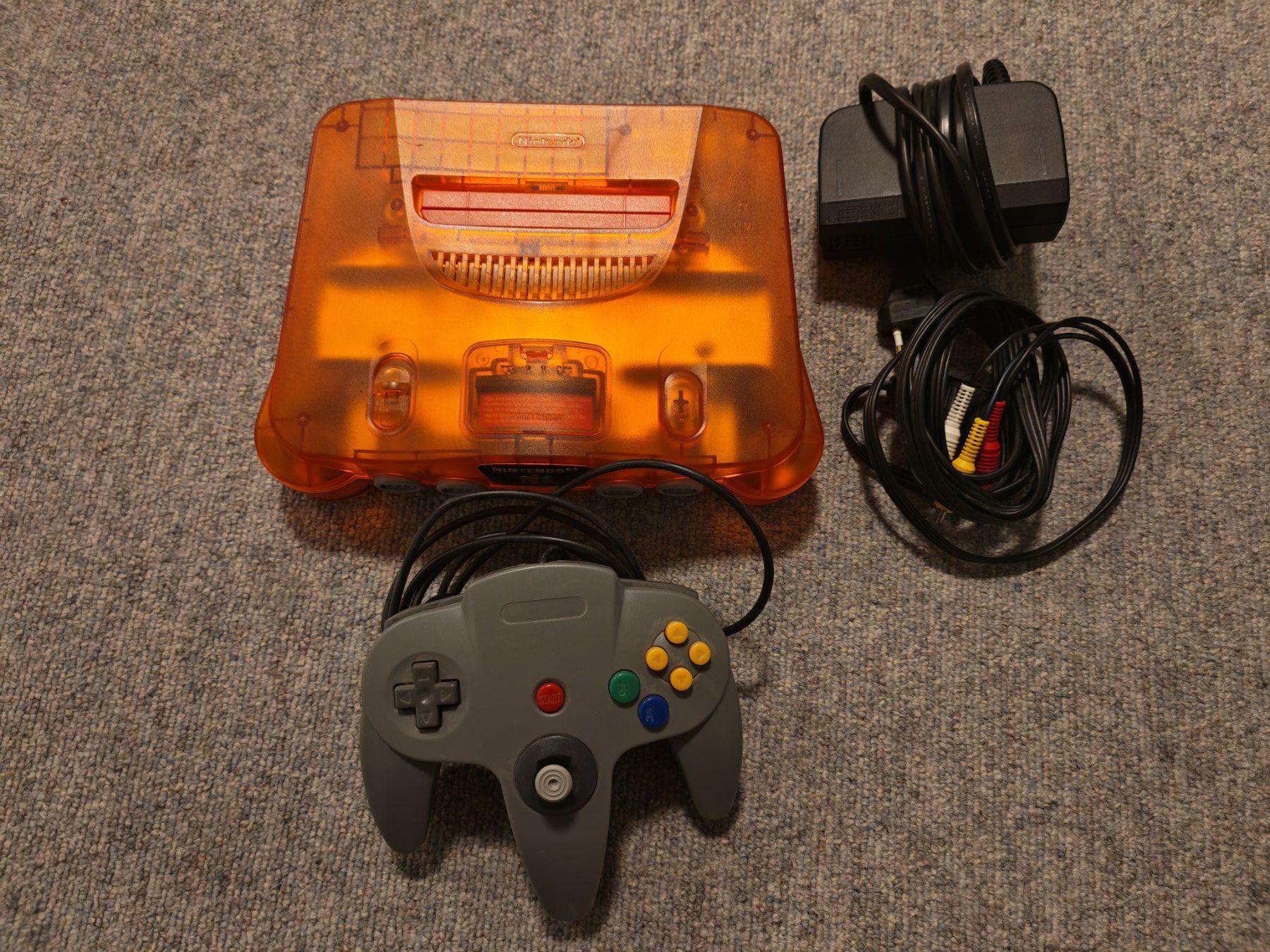 Nintendo Konsolen: Nintendo 64 Konsole Orange mit Controller ab 1.- – Gebraucht aus Thun von Kankii
