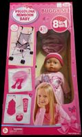 Puppenset 8in1: Baby Puppe mit Buggy und Zubehör neuwertig
