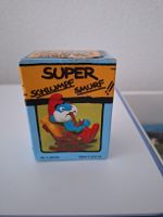 Papaschlumpf im Schauckelstuhl Superschlumpf