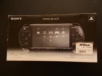 Sony PSP 3004 Slim Lite inkl. 3 Spielen, neuwertig aber ohne Akku