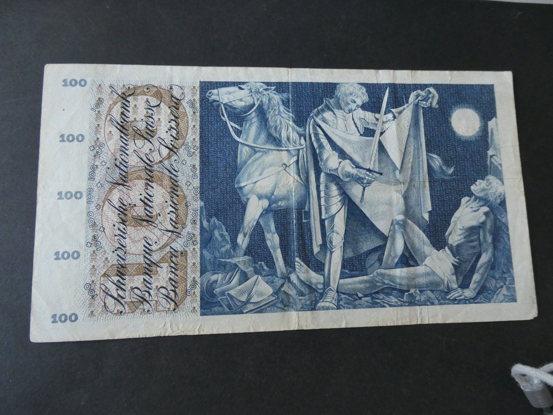Banknoten: Schweiz 1957,  100 Franken – Gebraucht aus Hinterforst von Rohusri 1