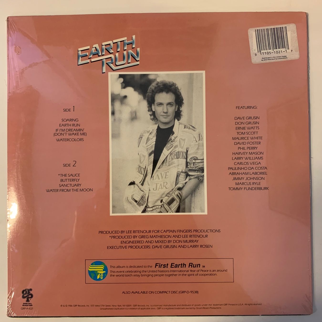 Dischi in vinile: Lee Ritenour - Earth Run, Vinyl LP Neu/Mint – Usato da Aesch BL venduto da BlueMusicRecords 1