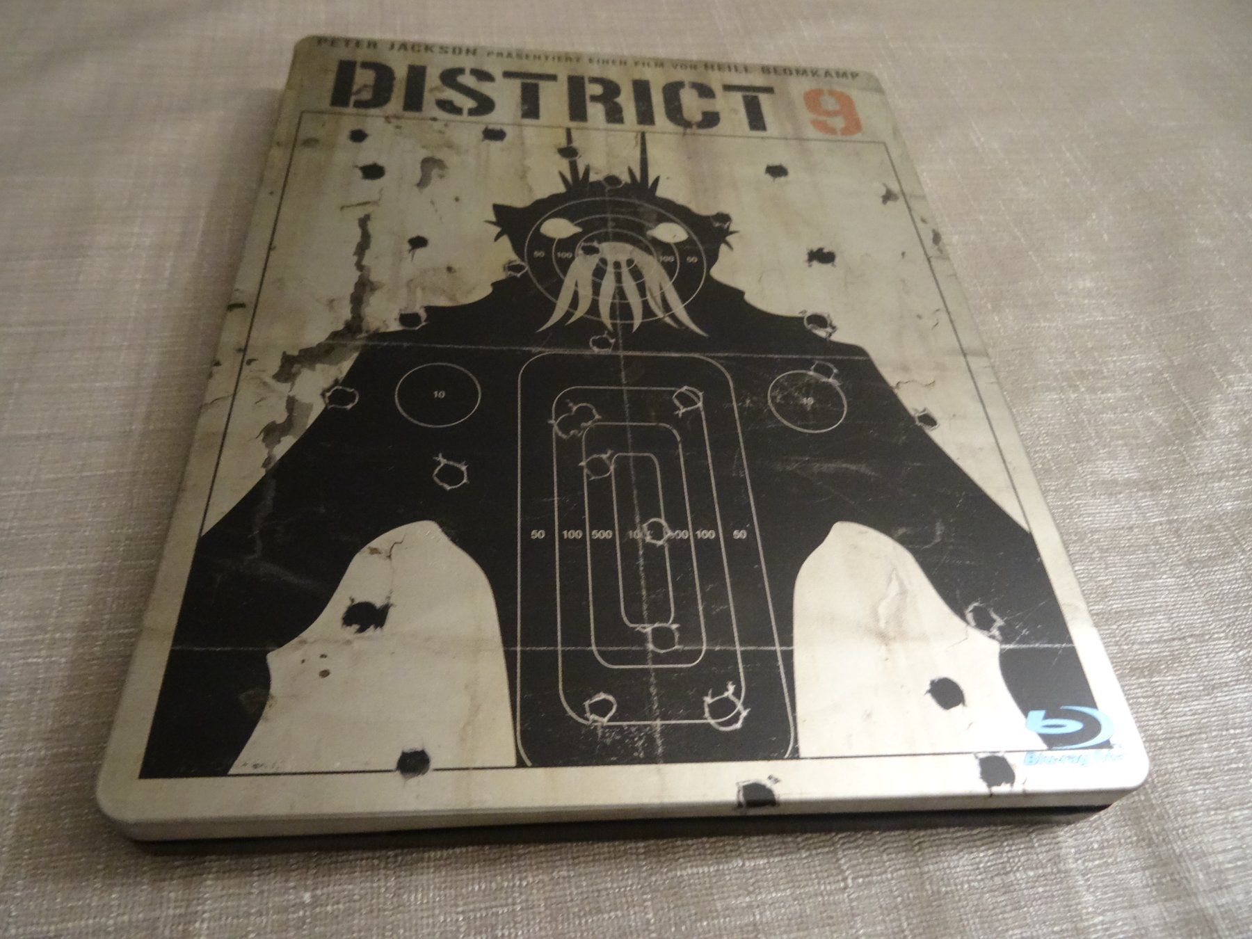 Tutti i DVDs: District 9 STEELBOOK BLU-RAY – Usato da Olten venduto da Disc-Verkauf