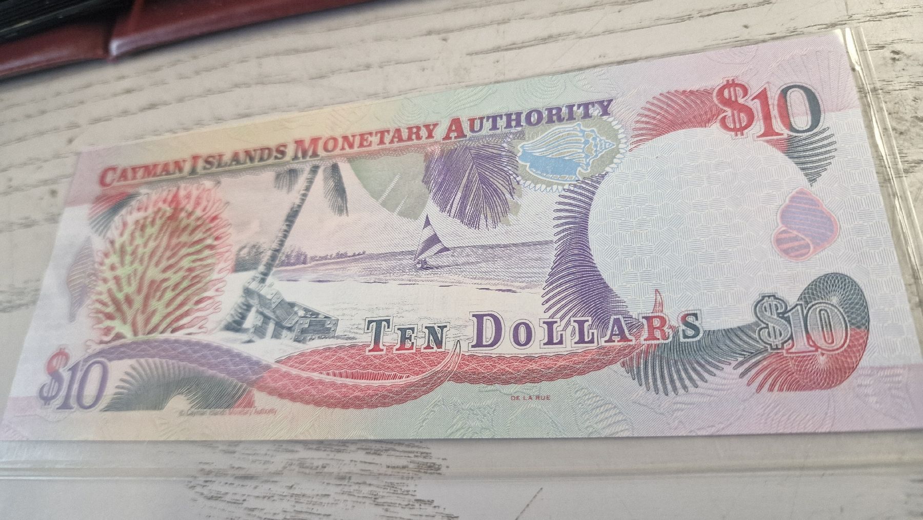 Banconote: Cayman Islands 10 Dollar Noten 2001 Revision  – Nuovo e nell'imballaggio originale da Herisau venduto da Antiques.AR 1