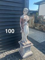 TWO IDENTICAL STATUES 