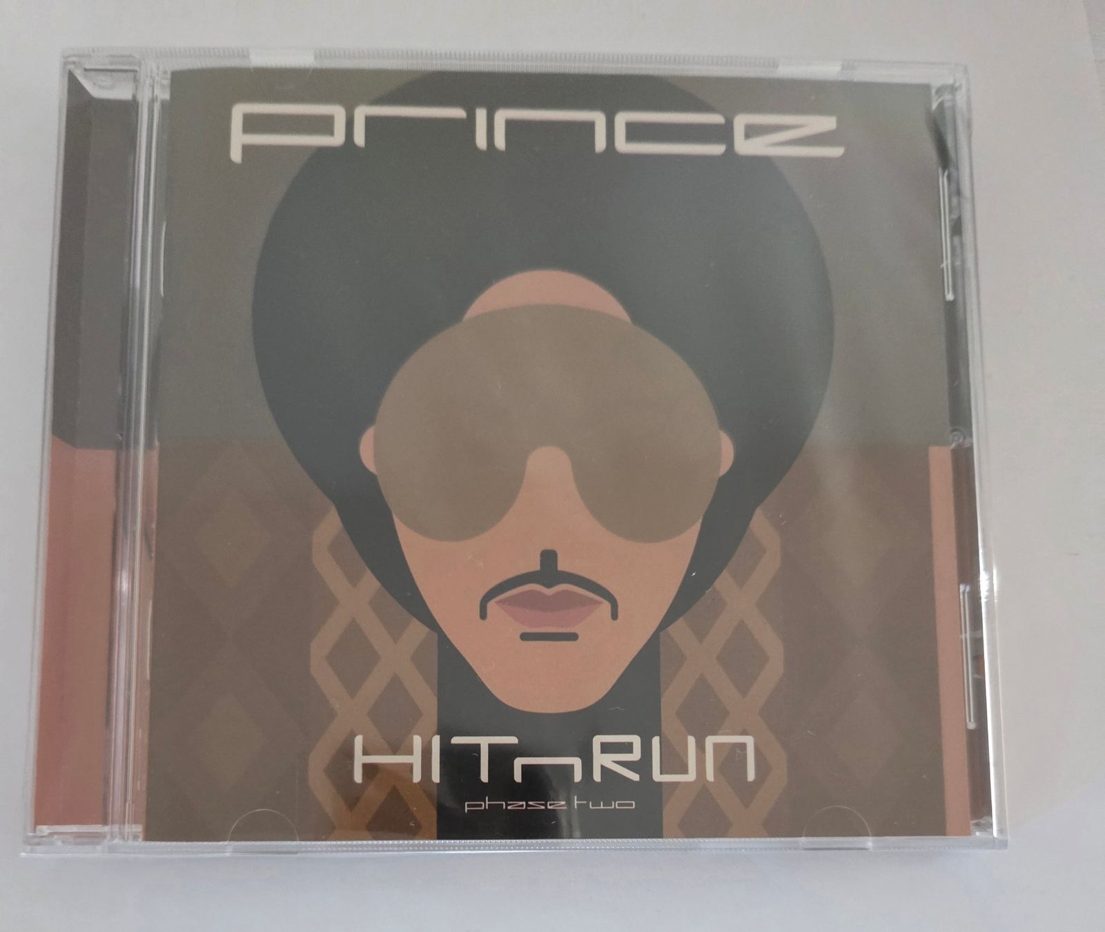 CD: Prince - Hit N Run Phase 2 - CD - originalverpackt – Nuovo e nell'imballaggio originale da Olten venduto da clayrout