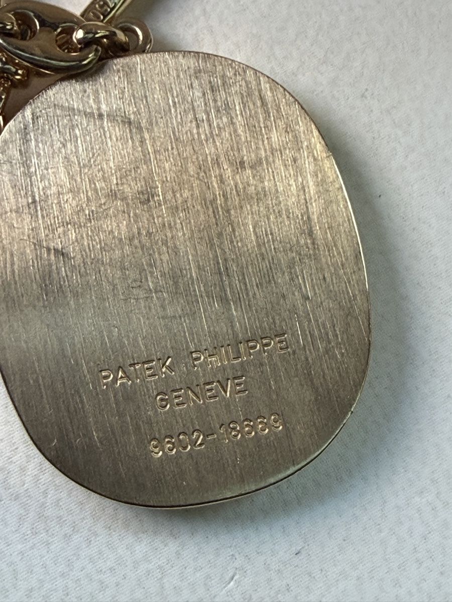 Patek Philippe Portachiavi: Porte clés Patek Philippe elipse en or blanc – Usato da Bellevue venduto da bordeaux075cl 1