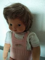 Süsse Stoffpuppe mit rosa Strickkleidung, Vintage Stil