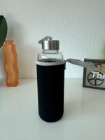 Glass bottle with black sleeve 500ml new