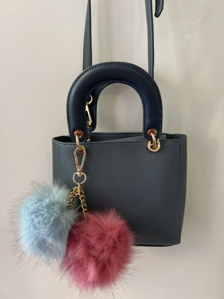 Manor Borse da donna: Kleine graue Handtasche mit Pompons – Usato da Oberglatt ZH venduto da ble_75jw 1