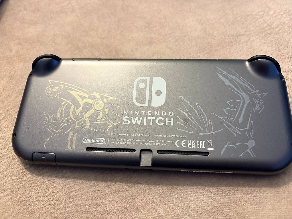 Nintendo Console: Nintendo Switch Lite Édition Dialga & Palkia + jeu Pokemon – Usato da Collombey venduto da malik.bkn 1