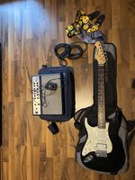 Linkshändler E-Gitarre Aria STG + Verstärker + Rucksack