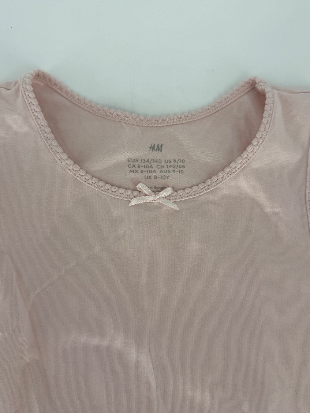 Camicette, T-shirt & Top: Rosa Top Gr. 134/140 von H&M – Usato da Auenstein venduto da moin. 1