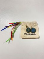 Desiguale Ohrringe