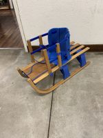 Kinderschlitten mit Sitz