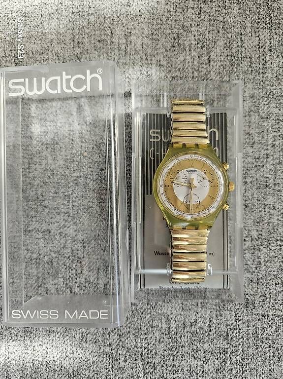 Montres: Swatch "Golden Globe" – D'occasion à Wallisellen par BeautyBee