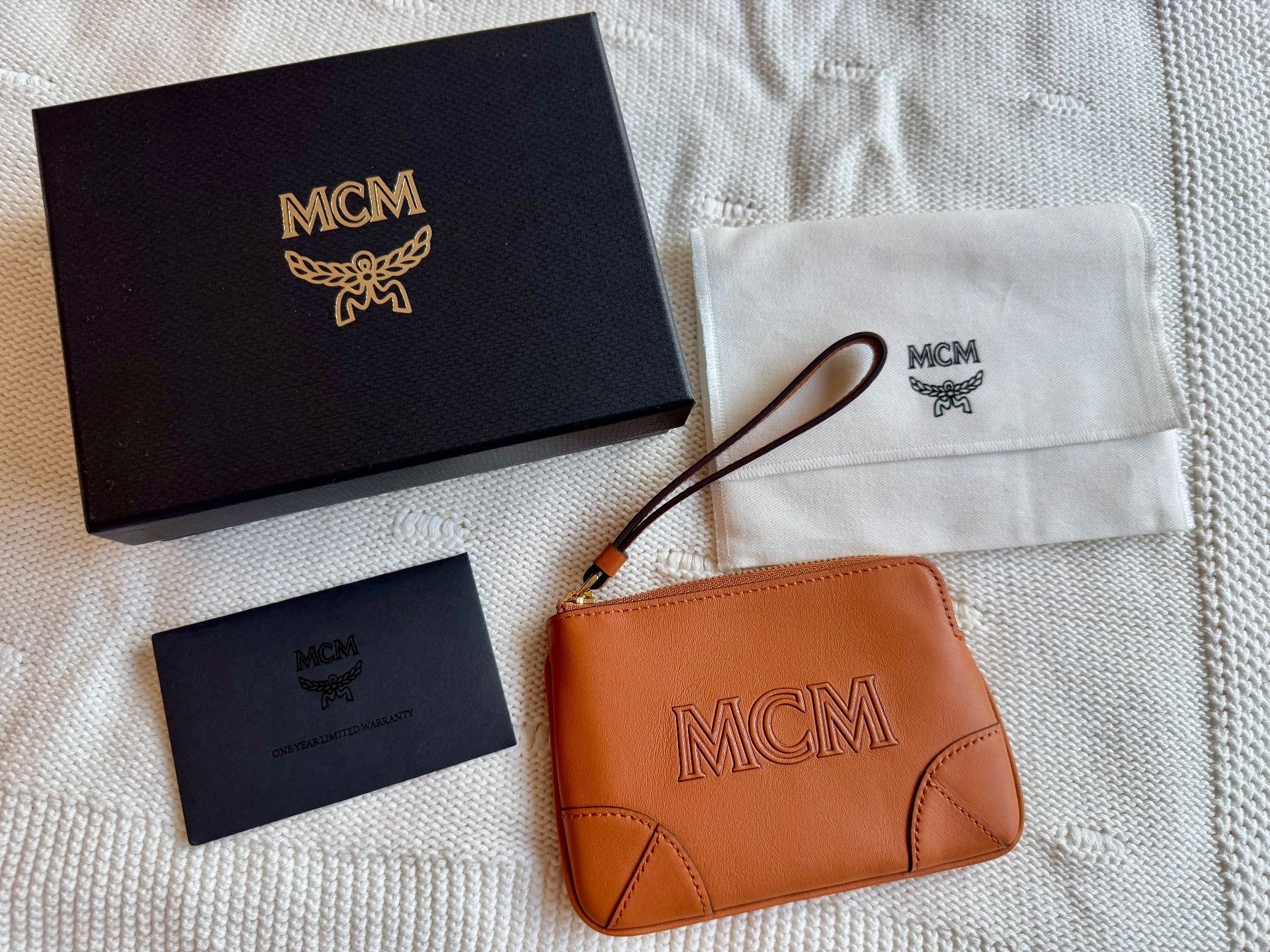 Mcm Borse: NEU: MCM Mini- Pochette, Aren, Braun – Nuovo e nell'imballaggio originale da Zürich venduto da SH_ZHCH