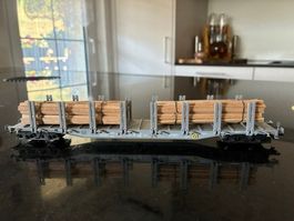 Doppelrungenwagen beladen mit Holz, H0