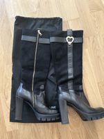 Moschino Stylish Black Boots with Heart Detail