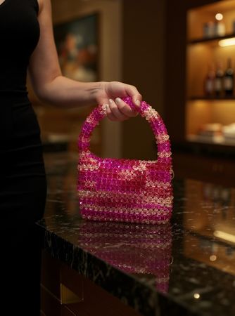 Pochette in perline di cristallo fatta a mano