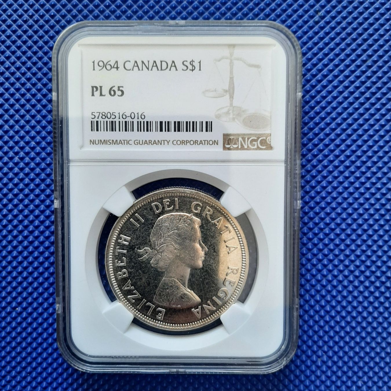 Tutti le monete: 1964 Canada Dollar NGC PL65 Charlottetown – Nuovo e nell'imballaggio originale da Carouge GE venduto da cecob0909