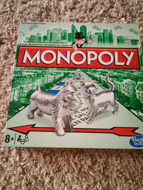 Hasbro Monopoly – Der Schock, Brettspiel Für 2-8 Spieler Ab 8 Jahren, Dynamischer Partyspaß Im Shuffleboard-Stil, Italienische Version