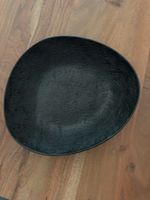 Schwarze Essteller organische Form gute Zustand