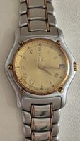 Montre Ebel 1911 acier or lunette cadran or 18k