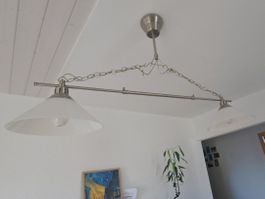 Luminaire suspendu réglable en longueur et hauteur