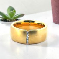 Goldener Ring mit Zirkoniasteinen, Grösse 61, neuwertig!